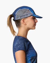 Cappellino da corsa, indossato, vista laterale